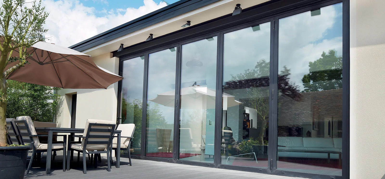 Black aluminium window installation in a Northern Ireland home