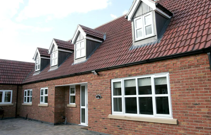 Double-glazed casement window installation