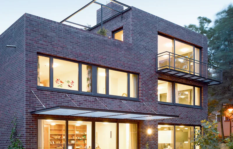Grey aluminium casement windows installed on a modern home