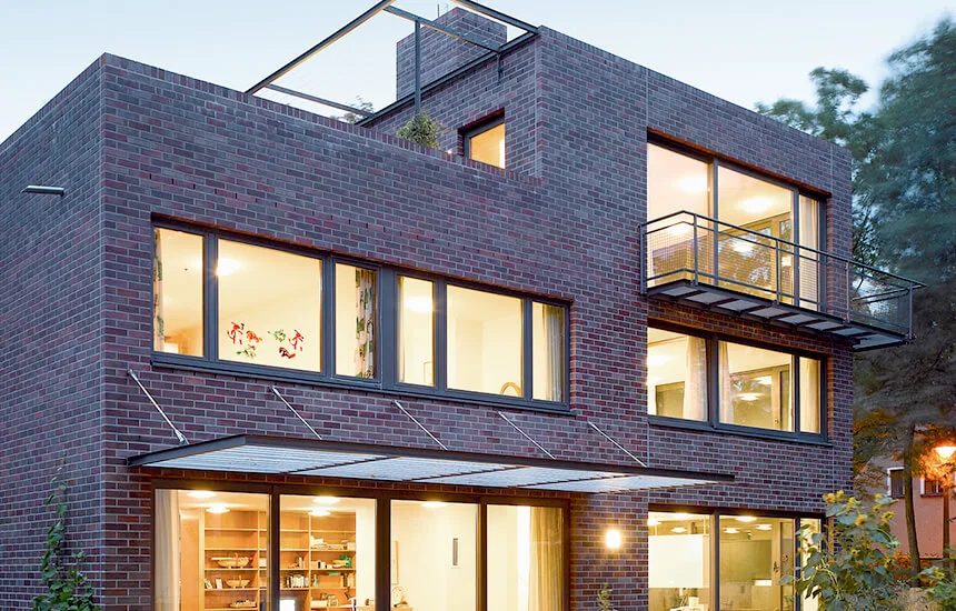 Grey aluminium casement windows installed on a modern home