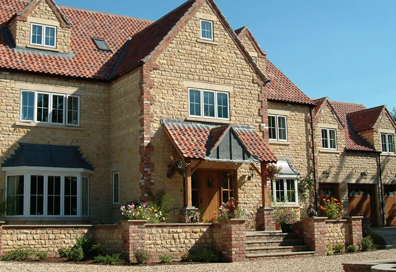 Heritage casement window installation on a Northern Ireland home