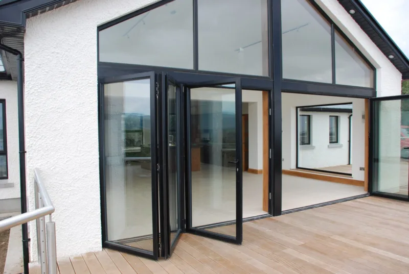 Turkington sliding and bifold patio doors opening onto garden