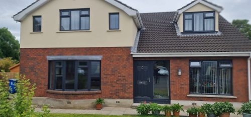 black windows and black front door installation