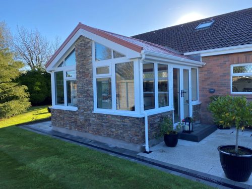 white upvc ultraroof conservatory with white upvc french doors